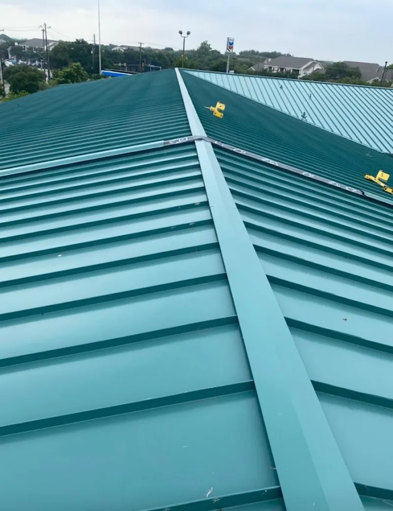 Green commercial metal roof ridge and valley for Metal Roof Repair in Southchase